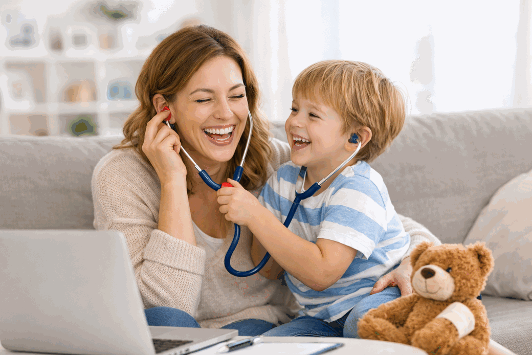 Mother and child smiling with stethoscope — healthcare made personal